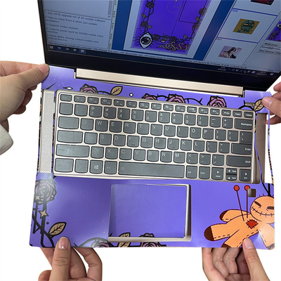 カスタマイズされたラップトップOEMの皮のカッターの機械によって改装されるラップトップはステッカーの設計の皮を剥ぐ